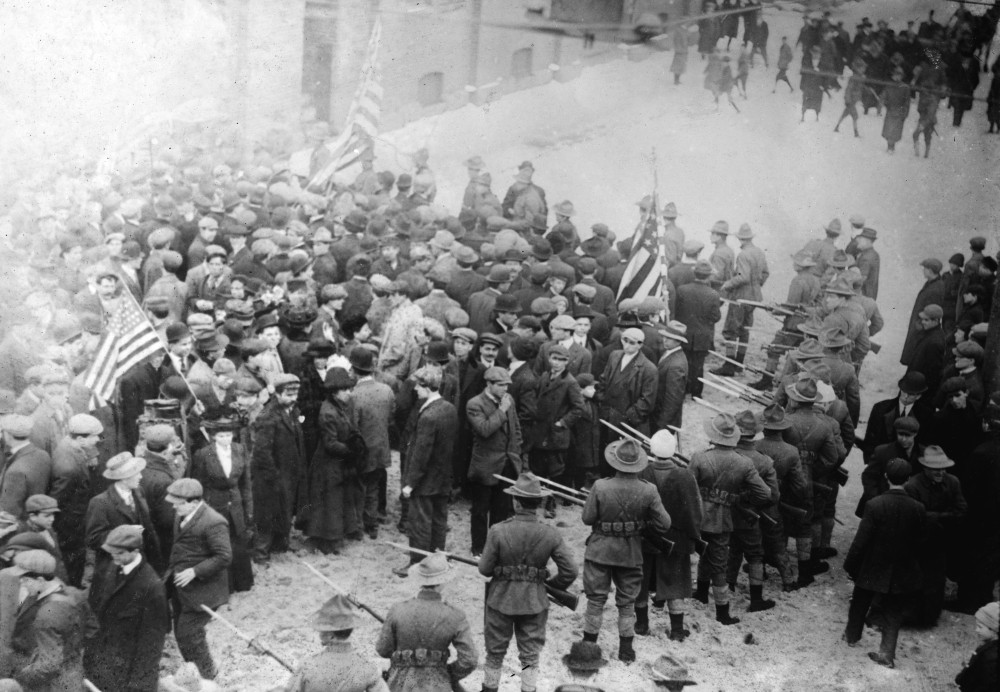 State militiamen facing striking workers